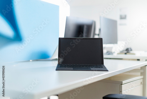 Digital tablet on desk at place of work