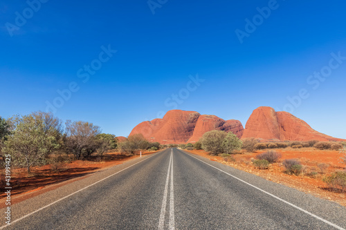 Australia, Northern Territory, Kata Tjuta road through Central Australian Desert photo