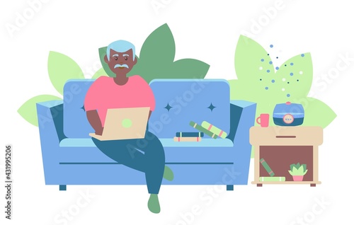 Freelancer working at home Senior african american man seat on sofa with note book and humidifier near nightstand