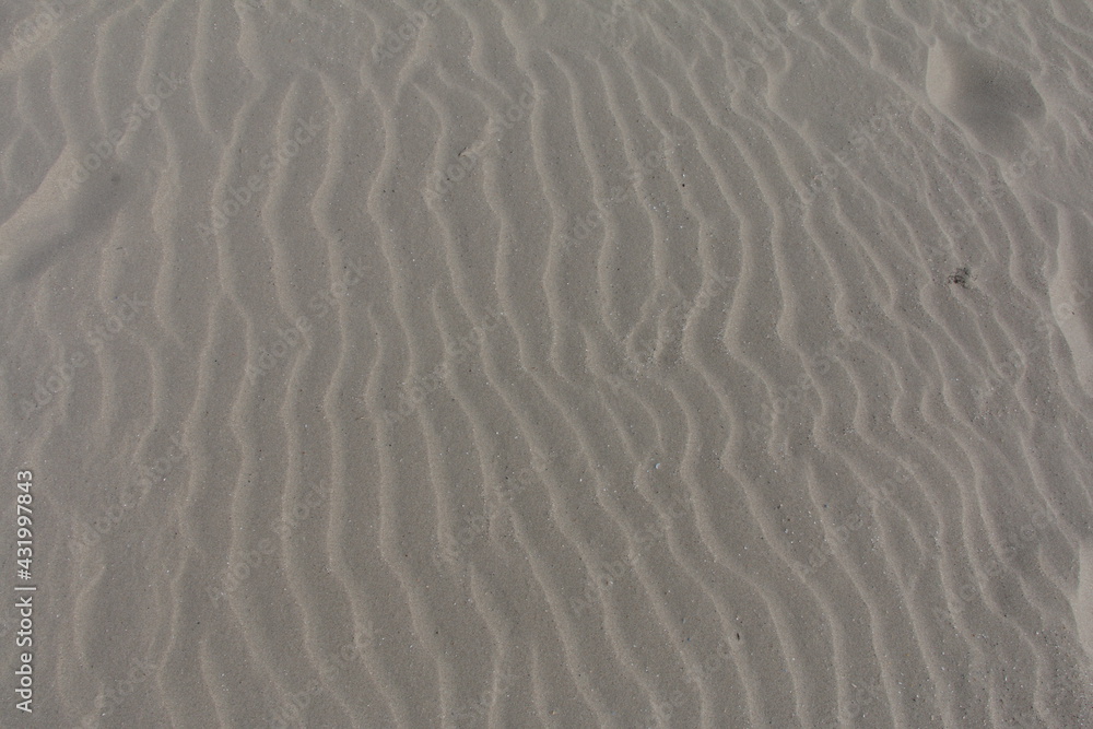 Obraz premium waves on sand