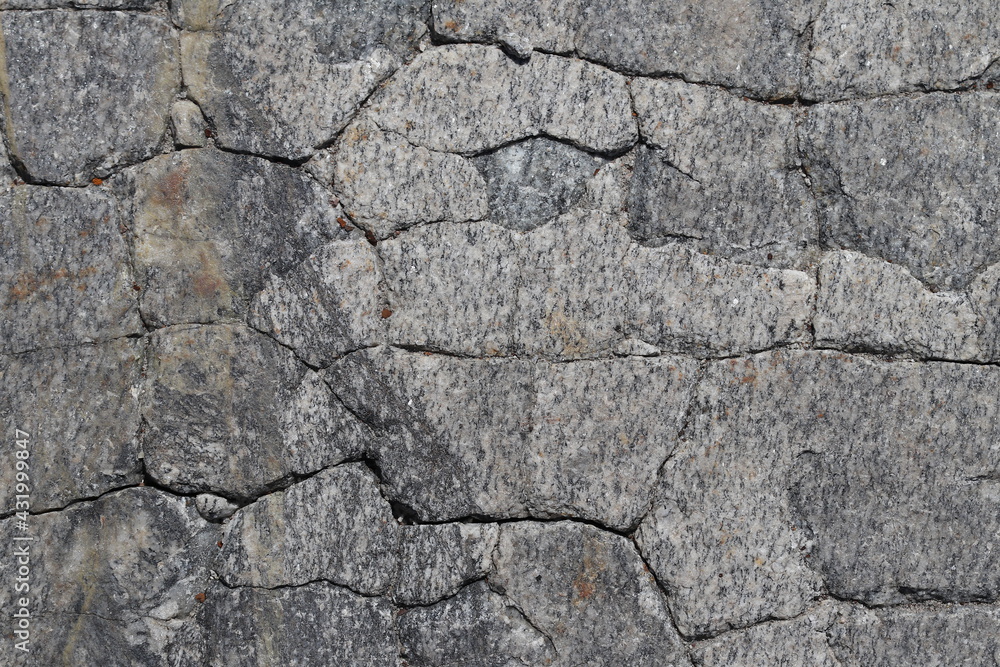 Fotografia do Stock The texture of cracked paving slabs. The paving
