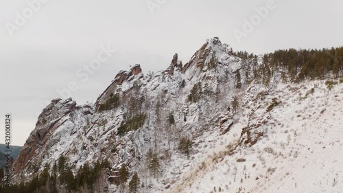 The national park Krasnoyarskie Stolby The Krasnoyarsk Pillars The Takmak hill The ridge of Takmak Winter Forest Cliffs Russia Siberia Krasnoyarskiy Kray Krasnoyarsk photo