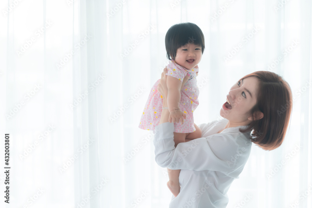 Mother and daughter newborn in home,Happy time of family,Single mom concept,Concept mother day Mother and daughter newborn in home,Happy time of family,Single mom concept,Concept mother day