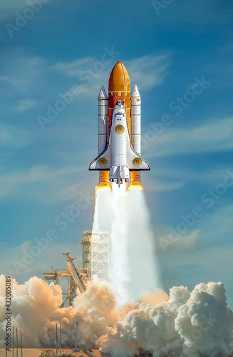 Fototapeta Naklejka Na Ścianę i Meble -  Spaceship takes off into the sky. Rocket starts into space. Bitcoins and New Virtual money concept. 