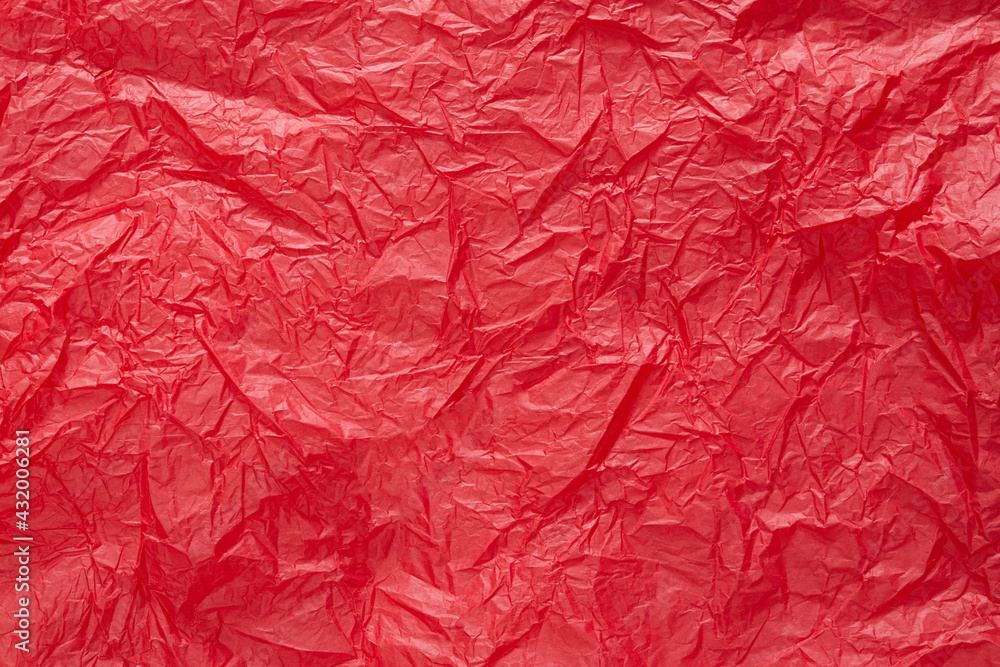 Red crumpled paper or sheet texture background for Design. Wallpaper for text. Copy space. Red crumpled paper or sheet texture background for Design. Wallpaper for text. Copy space.