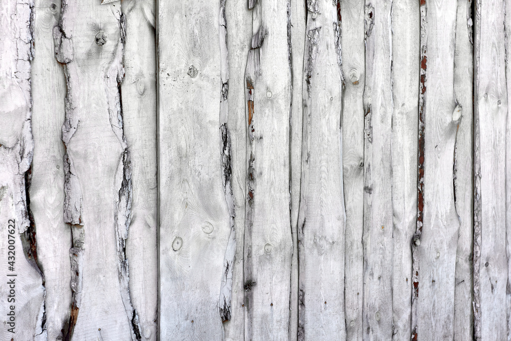 Wall texture of rough wooden planks painted with white paint Wall texture of rough wooden planks painted with white paint