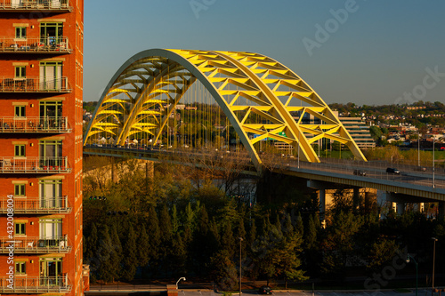 Slika na platnu Daniel Carter Beard Big Mac Bridge at Sunrise - Yellow Steel Arch - Interstate