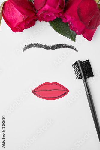 Creative concept of a woman's face. Cosmetics concept on white background. Brow Bar concept