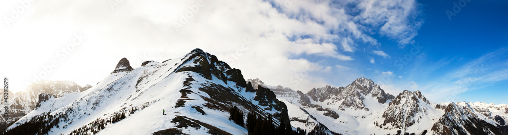 Sterling Roop stands on the ridge between Mount Ridgway and Mount Sneffels in the San Juan Mountains, Colorado. Sterling Roop stands on the ridge between Mount Ridgway and Mount Sneffels in the San Juan Mountains, Colorado.