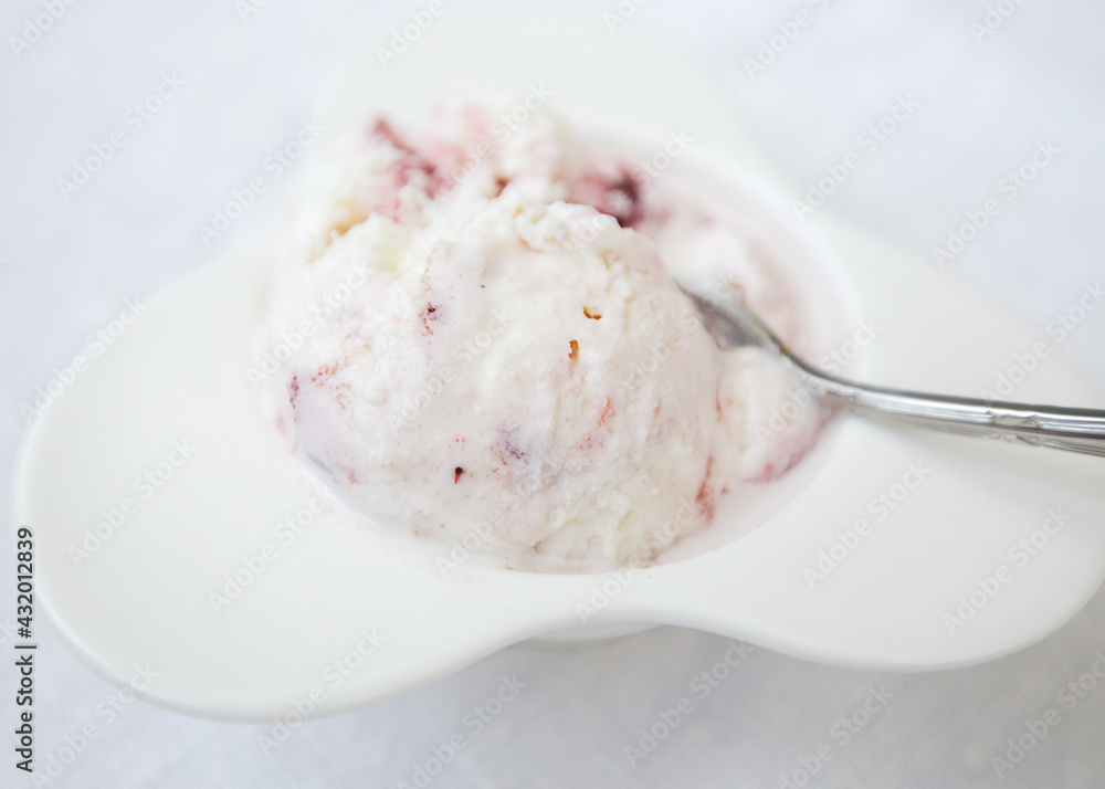 one white ball vanilla strawberry white plate spoon. Summer sweets, delicious treats, italian desserts, pamper yourself, dairy desserts concept. one white ball vanilla strawberry white plate spoon. Summer sweets, delicious treats, italian desserts, pamper yourself, dairy desserts concept.