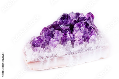 Fototapeta Naklejka Na Ścianę i Meble -  Macro mineral stone purple amethyst in crystals on a white background