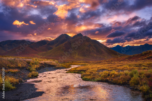 A small tributary of the Yukon River leading to epic sunset light in the foothills of the Tombstone Range, Yukon Territory. photo