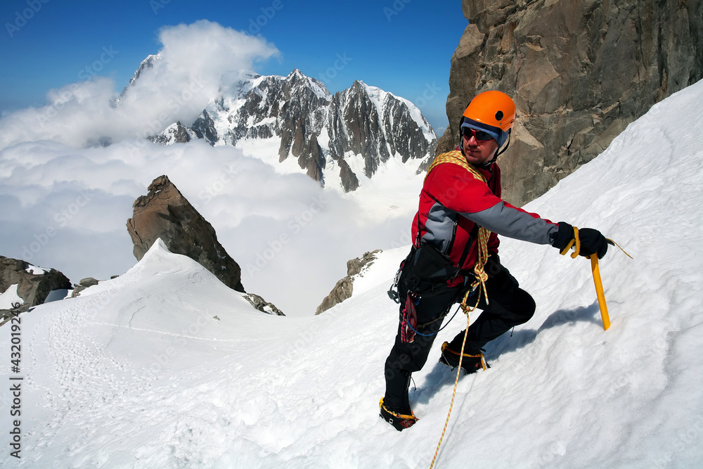 Alpinist on Dent du Geant, in Haute Savoie, France, Europe