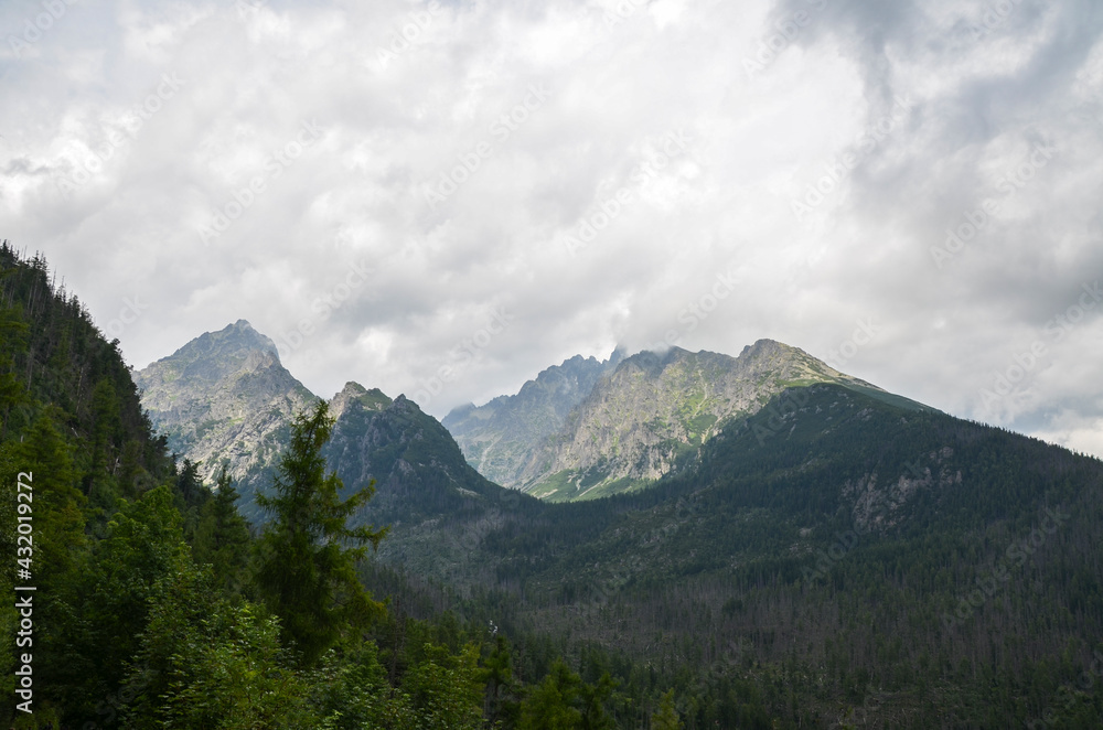 Rocky landscape with gorgeous mountain range with high peaks in National Park High Tatras in Slovakia