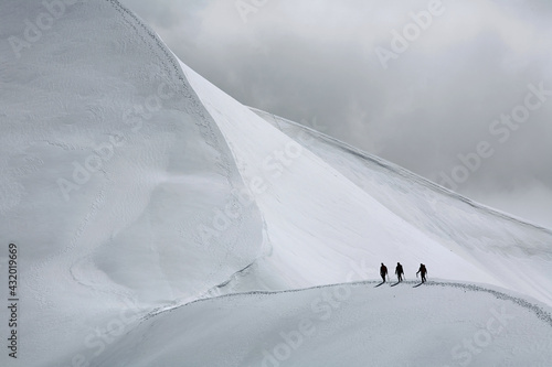 Team of climbing alpinists in Haute Savoie, France, Europe