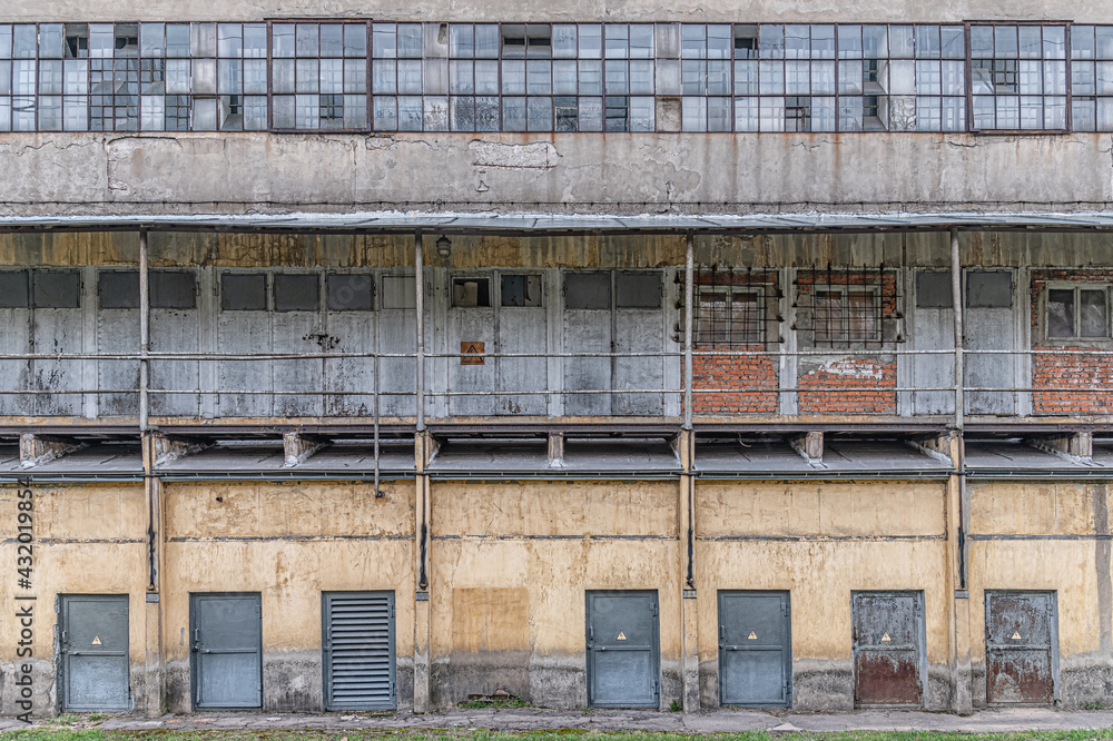 facade of an old concrete industrial building