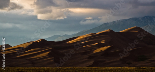 The dunes were formed from sand deposits of the Rio Grande and its tributaries, flowing through the San Luis Valley. photo