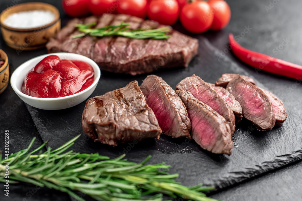 grilled beef steak on stone background