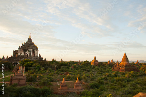 The sun rises over the 2000+ temples and pagodas at Bagan in the country of Burma (Myanmar) photo