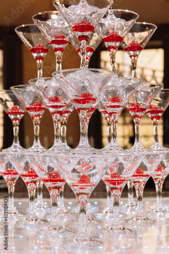 Pyramid from champagne glasses on the party