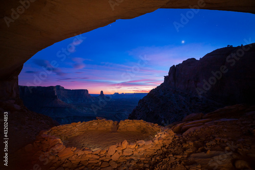 Color greeting Night. In an ancient and remote place in Canyonlands National Park, the sun had long set. photo