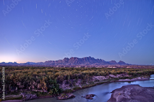stars over the chisos mountains and rio grande river big bend national park, Texas