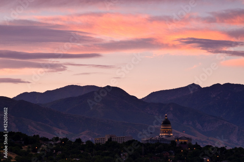Dawn over the Utah State Capitol and Wasatch Mountains in Salte Lake City, Utah. photo