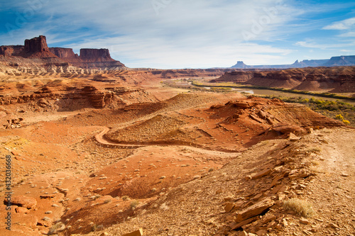The rugged canyons of Canyonlands National Park extend in all directions as seen from The White Rim Trail above the Green River near Moab, Utah. photo