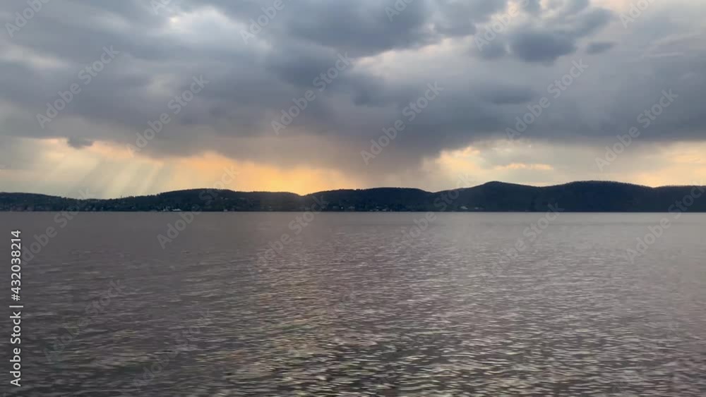 sunset over hudson river new york cloudy sky sunset over hudson river new york cloudy sky