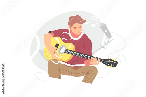 Young musician playing guitar instrument