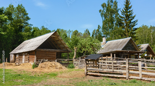Livestock shed. Wooden barn for cows and goats. Farming