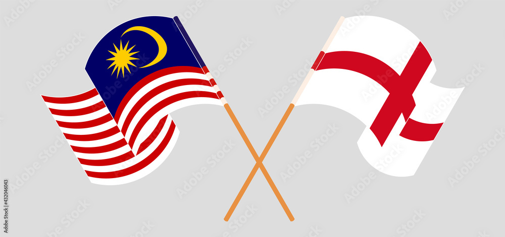 Crossed and waving flags of Malaysia and England Crossed and waving flags of Malaysia and England