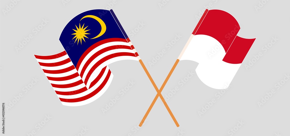 Crossed and waving flags of Malaysia and Monaco Crossed and waving flags of Malaysia and Monaco