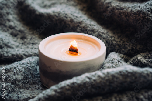 Canvas Print Burning candle with wooden wick, handmade natural wax candle