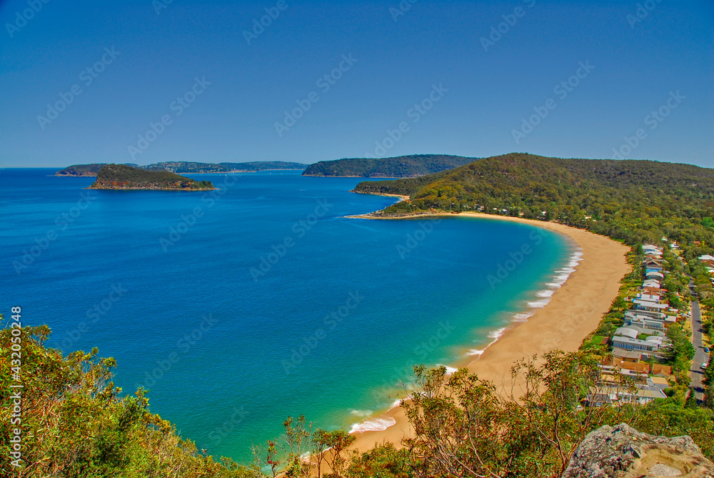 Beautiful Pearl Beach And Broken Bay are seen from the view at Mount Ettalong lookout above the New South Wale's coastal town of Pearl Beach in Australia.