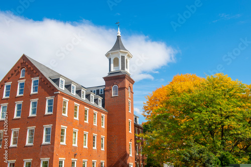 Busiel Seeburg Mill on Opechee Bay Reservoir at 1 Mill Plaza in city of Laconia, New Hampshire NH, USA.  photo