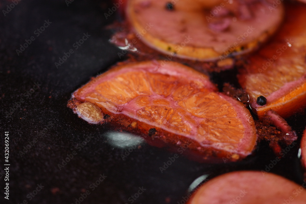 Traditional Christmas mulled wine hot drink. red wine with cloves, nutmeg,cinnamon and orange Traditional Christmas mulled wine hot drink. red wine with cloves, nutmeg,cinnamon and orange