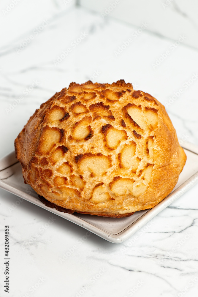 Fresh baked Tiger Bread roll also known as Dutch Crunch. Fresh baked Tiger Bread roll also known as Dutch Crunch.