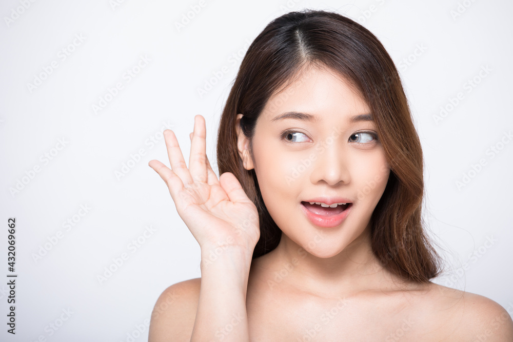 Portrait of young woman model posing with her hands isolated on white studio background Portrait of young woman model posing with her hands isolated on white studio background