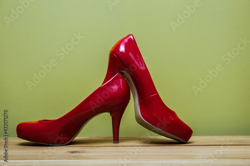 A red high heels on table