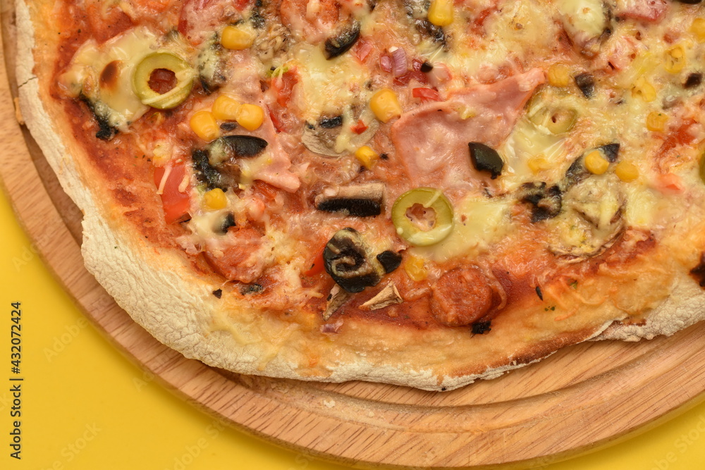 homemade pizza with olives and cheese, detail