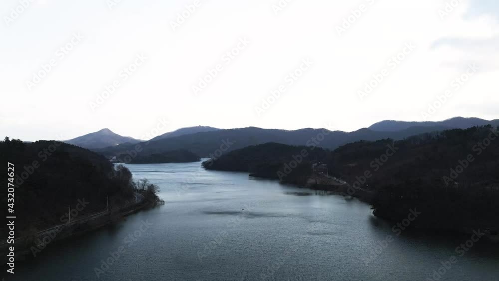 Aerial drone shot of beautiful cinematic South Korean river and forest in nature Aerial drone shot of beautiful cinematic South Korean river and forest in nature