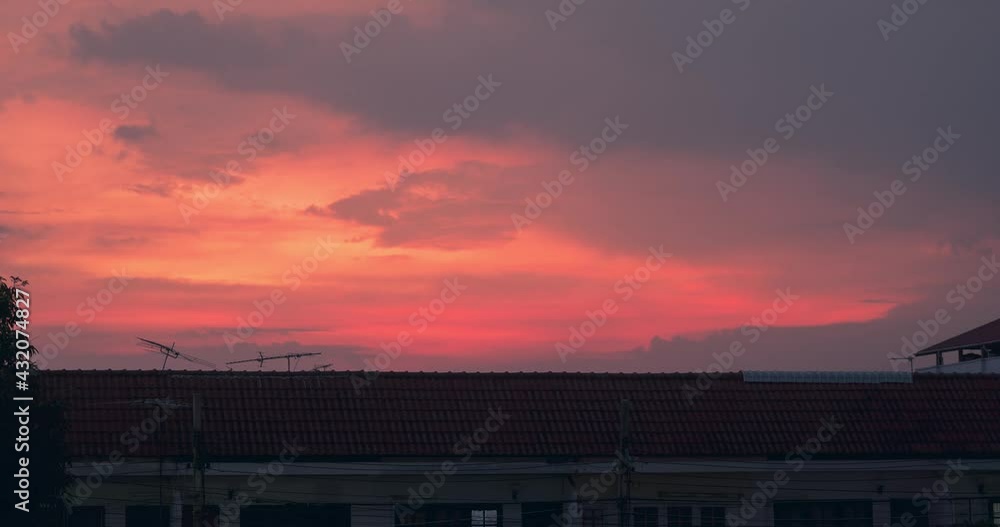 Colorful Sunset Over Roof Of Houses With Antenna. - wide static