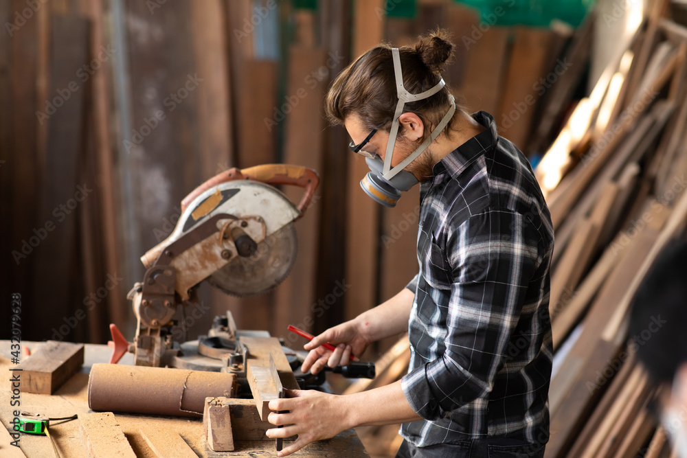 Carpenter woking at wood workshop. Construction industry concept. Tools for woodwrok pencil hammer meter and screw-driver. Carpenter woking at wood workshop. Construction industry concept. Tools for woodwrok pencil hammer meter and screw-driver.