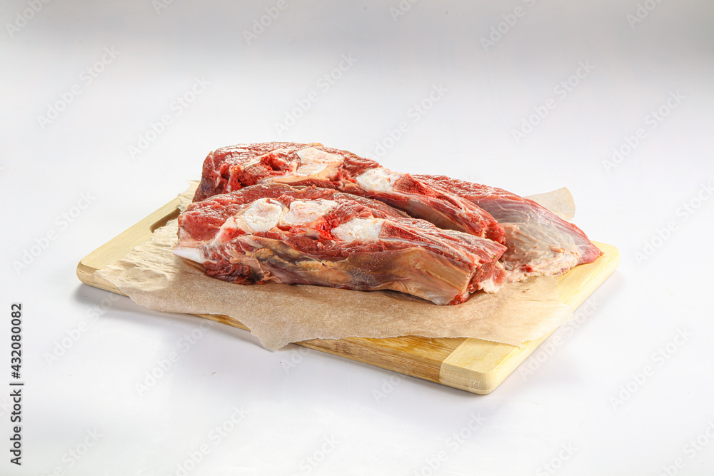 Raw bones for cooking over board Raw bones for cooking over board