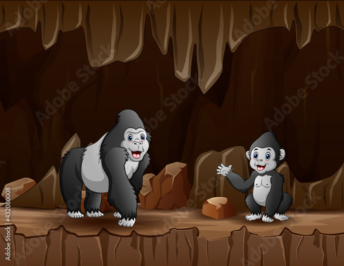 Cartoon a gorilla with her cub in the cave