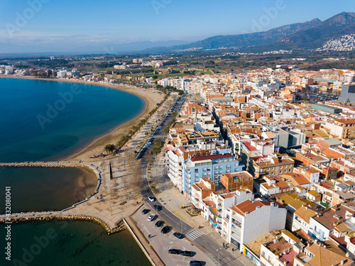 Panoramic view from drone of Mediterranean seascape of Roses city, Spain