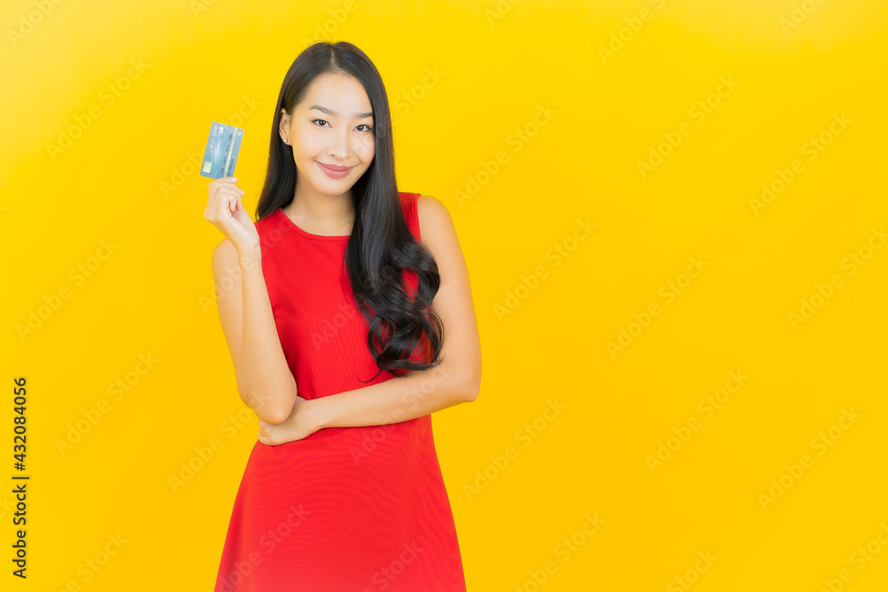 Portrait beautiful young asian woman smile with credit card Portrait beautiful young asian woman smile with credit card