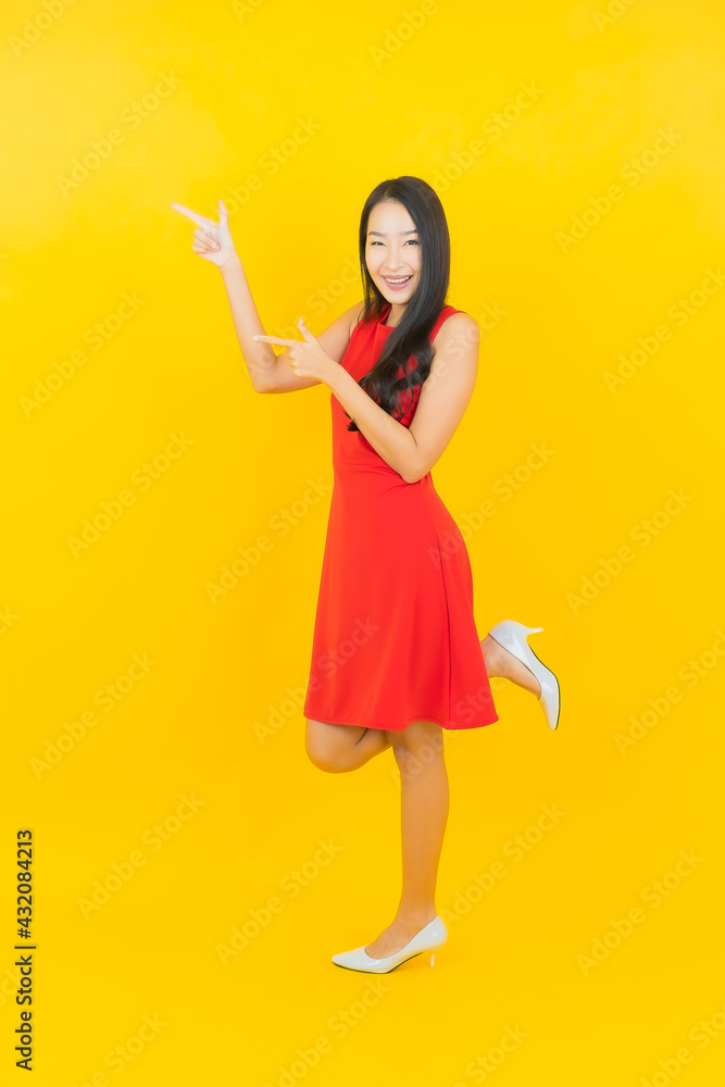 Portrait beautiful young asian woman smile with action Portrait beautiful young asian woman smile with action
