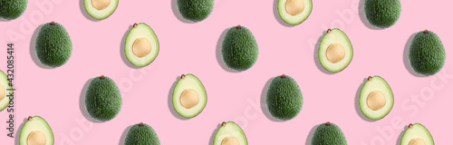 Avocado colorful pattern on a pastel pink background.